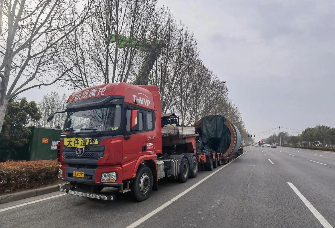 宜兴市挖掘机运输_大型铲车运输—专注大件运输-第3张图片